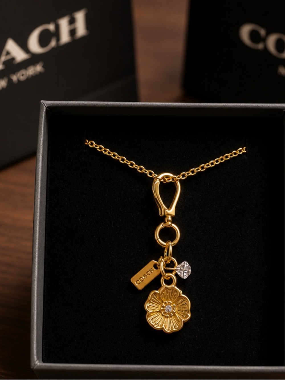 COACH Gold Toned Poppy Pendant w/Gold Toned Chain (20”)